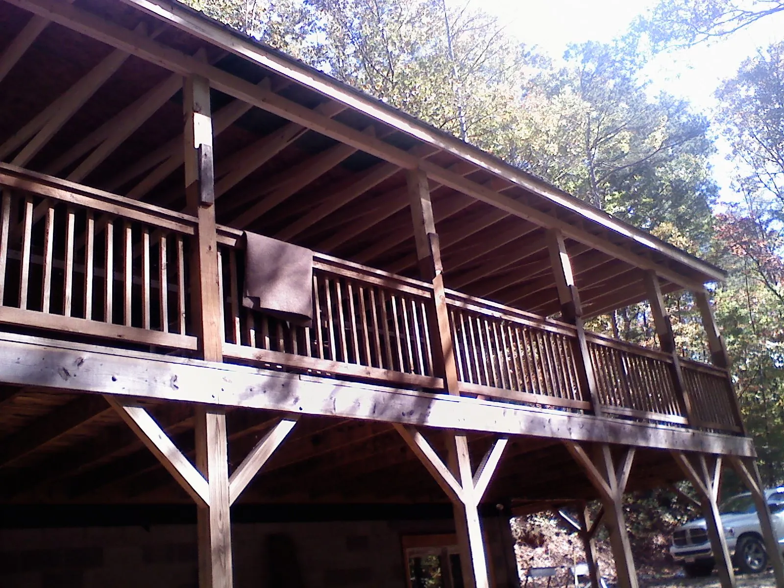 Timber framing under a new elevated porch and deck — Roof Leak Repair in Lunenburg by Roofing Brothers